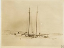 Image of Bowdoin by moonlight in winter quarters - Note full moon during the day